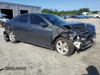2011 Toyota Camry LE with VIN 4T1BF3EK7BU771131, listed as a Copart auction lot 61002205 with 215,482 mi miles and Salvage title. Bid and sale history available at DreamBid. Image 4.