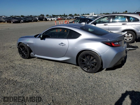2023 Toyota 86 Premium z VIN JF1ZNBE17P9752912, wystawiony jako Copart lot #56538765 z przebiegiem 31 403 mil mil oraz Szkoda całkowita • Salvage title. Historia ofert i sprzedaży dostępna na DreamBid. Obrazek 2.