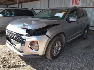 2020 Hyundai Santa Fe SE with VIN 5NMS2CAD1LH229586, listed as a IAAI auction lot 41392077 with 100,228 mi miles. Bid and sale history available at carsss.com. Image 2.