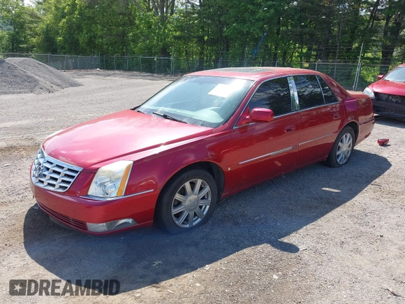2006 Cadillac DTS 1SC z VIN 1G6KD57YX6U188066, wystawiony jako IAAI lot #42300335 z przebiegiem 110 774 mil mil oraz . Historia ofert i sprzedaży dostępna na DreamBid. Obrazek 2.