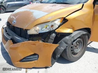 2009 Toyota Matrix S with VIN 2T1LE40E49C001740, listed as a IAAI auction lot 42088899 with 173,939 mi miles. Bid and sale history available at carsss.com. Image 6.