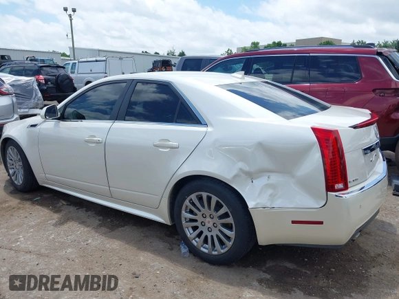 2012 Cadillac CTS Performance z VIN 1G6DK5E34C0116367, wystawiony jako IAAI lot #42373255 z przebiegiem 93 444 mil mil oraz . Historia ofert i sprzedaży dostępna na DreamBid. Obrazek 14.