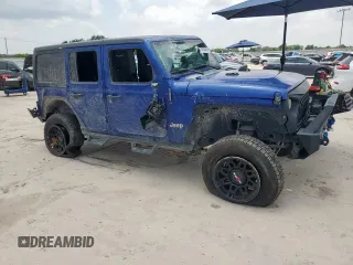2018 Jeep Wrangler Unlimited Sport S with VIN 1C4HJXDG0JW272837, listed as a Copart auction lot 57532455 with Not provided miles and Salvage title. Bid and sale history available at DreamBid. Image 4.