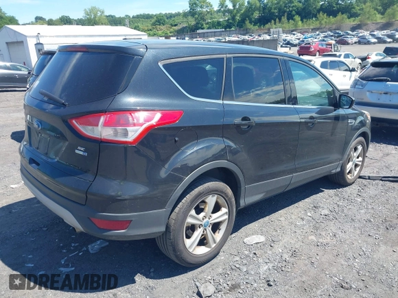 2014 Ford Escape SE with VIN 1FMCU9GX9EUA18422, listed as a IAAI auction lot 42765689 with 153,235 mi miles and . Bid and sale history available at DreamBid. Image 4.