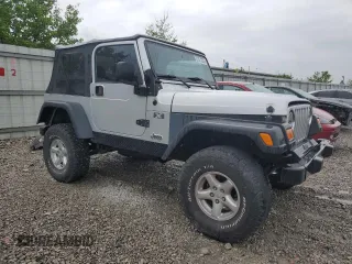 2004 Jeep Wrangler X with VIN 1J4FA39S24P714961, listed as a Copart auction lot 57871235 with 123,164 mi miles and Clean title. Bid and sale history available at DreamBid. Image 4.