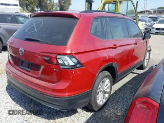 2018 Volkswagen Tiguan S with VIN 3VV1B7AX3JM128705, listed as a IAAI auction lot 42110808 with 60,589 mi miles and . Bid and sale history available at DreamBid. Image 4.