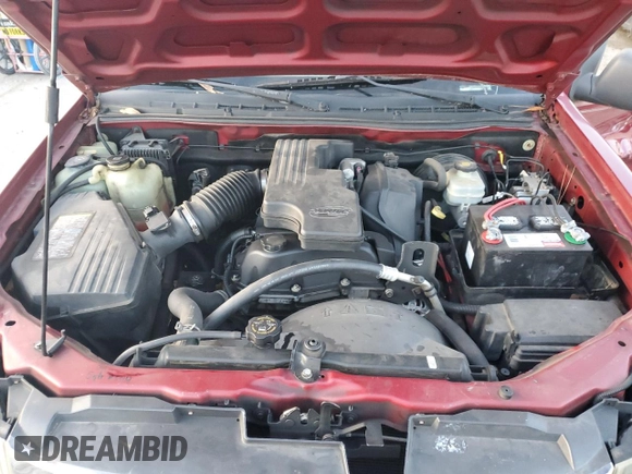 2006 GMC Canyon z VIN 1GTDS198968242449, wystawiony jako Copart lot #41538915 z przebiegiem 172 505 mil mil oraz Szkoda całkowita • Salvage title. Historia ofert i sprzedaży dostępna na DreamBid. Obrazek 11.