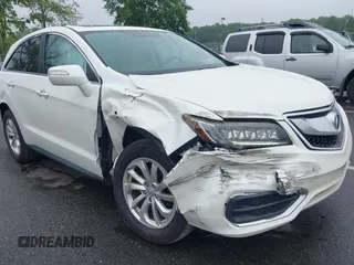 2018 Acura RDX with VIN 5J8TB4H31JL018201, listed as a IAAI auction lot 42459595 with 106,523 mi miles and . Bid and sale history available at DreamBid. Image 1.