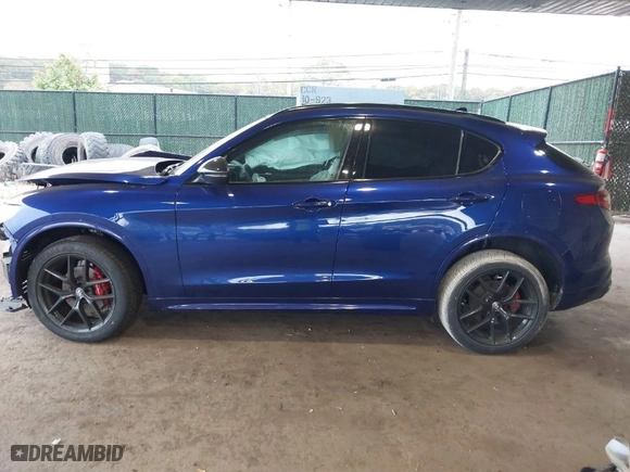 2021 Alfa Romeo Stelvio Ti with VIN ZASPAKBN4M7D21284, listed as a IAAI auction lot 40573443 with 26,230 mi miles. Bid and sale history available at carsss.com. Image 14.
