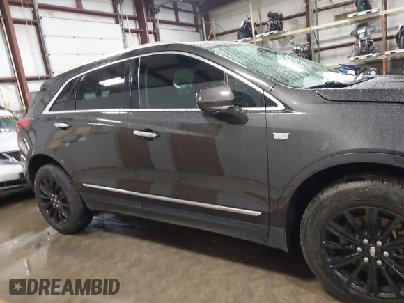 2018 Cadillac XT5 Luxury FWD with VIN 1GYKNCRS8JZ184322, listed as a IAAI auction lot 41225319 with 97,729 mi miles and . Bid and sale history available at carsss.com. Image 13.