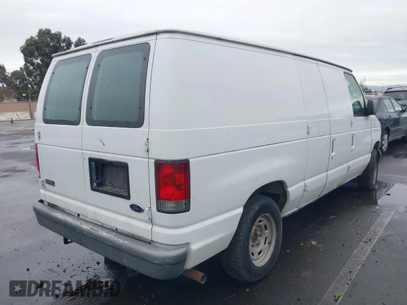 2004 Ford Econoline Cargo with VIN 1FTRE14W44HA43969, listed as a IAAI auction lot 41488289 with 268,097 mi miles. Bid and sale history available at carsss.com. Image 4.