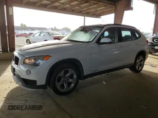2015 BMW X1 sDrive28i with VIN WBAVM1C50FVW58031, listed as a Copart auction lot 48552735 with 205,392 mi miles and Salvage Title. Bid and sale history available at carsss.com. Image 1.