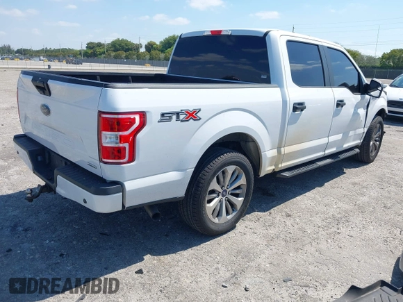 2018 Ford F-150 XL with VIN 1FTEW1CP8JKE91006, listed as a IAAI auction lot 42123840 with 76,806 mi miles and . Bid and sale history available at DreamBid. Image 4.
