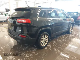 2015 Jeep Cherokee Latitude with VIN 1C4PJLCB9FW536767, listed as a IAAI auction lot 41380122 with 192,535 mi miles. Bid and sale history available at carsss.com. Image 4.
