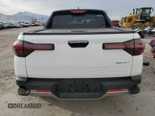 2023 Hyundai Santa Cruz Limited z VIN 5NTJEDAF8PH069811, wystawiony jako Copart lot #52806245 z przebiegiem 17 223 mil mil oraz Szkody całkowita. Historia ofert i sprzedaży dostępna na DreamBid. Obrazek 6.
