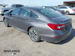 2020 Honda Accord Touring with VIN 1HGCV3F90LA013434, listed as a IAAI auction lot 42075502 with 56,645 mi miles and . Bid and sale history available at DreamBid. Image 3.