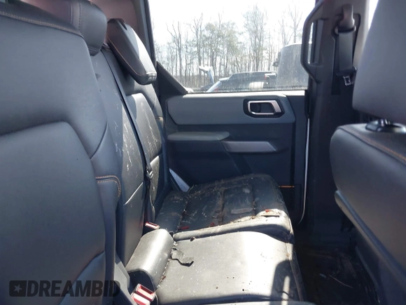 2023 Ford Bronco z VIN 1FMEE5DP0PLC12557, wystawiony jako IAAI lot #41854143 z przebiegiem 9 839 mil mil oraz . Historia ofert i sprzedaży dostępna na DreamBid. Obrazek 8.