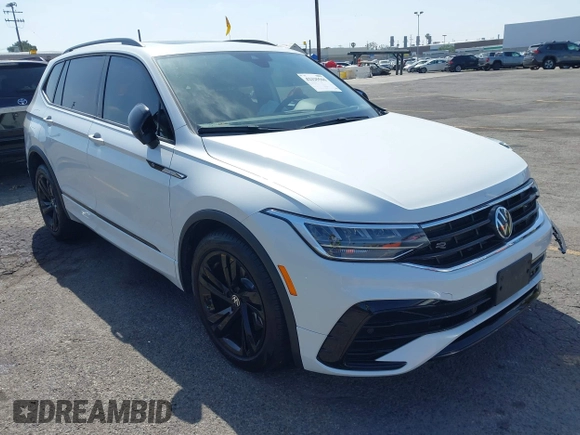 2024 Volkswagen Tiguan SE R-Line Black with VIN 3VVCB7AX7RM085619, listed as a IAAI auction lot 42325566 with 10,615 mi miles and . Bid and sale history available at DreamBid. Image 1.