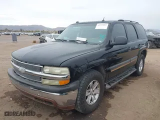 2005 Chevrolet Tahoe LT with VIN 1GNEC13T25R195635, listed as a IAAI auction lot 41581082 with 353,913 mi miles. Bid and sale history available at carsss.com. Image 2.
