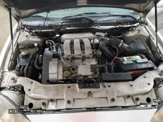 1999 Mercury Sable z VIN 1MEFM58S6XA647250, wystawiony jako Copart lot #83479674 z przebiegiem 166 550 mil mil oraz Szkody całkowita. Historia ofert i sprzedaży dostępna na DreamBid. Obrazek 11.