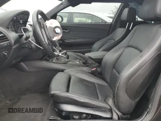 2009 BMW 1 Series 135i with VIN WBAUC73519VK95762, listed as a Copart auction lot 49636375 with 89,890 mi miles and Salvage title. Bid and sale history available at DreamBid. Image 7.