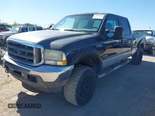 2003 Ford F-350 XL with VIN 1FTSW31P53ED22922, listed as a IAAI auction lot 42086364 with 310,073 mi miles and . Bid and sale history available at DreamBid. Image 2.