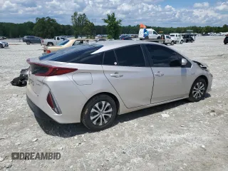 2021 Toyota Prius LE with VIN JTDKAMFPXM3184126, listed as a Copart auction lot 56857675 with 54,676 mi miles and Clean Title. Bid and sale history available at DreamBid. Image 3.