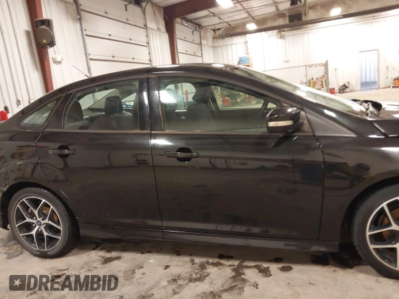 2015 Ford Focus SE with VIN 1FADP3F24FL255450, listed as a IAAI auction lot 41673301 with 103,650 mi miles. Bid and sale history available at carsss.com. Image 13.