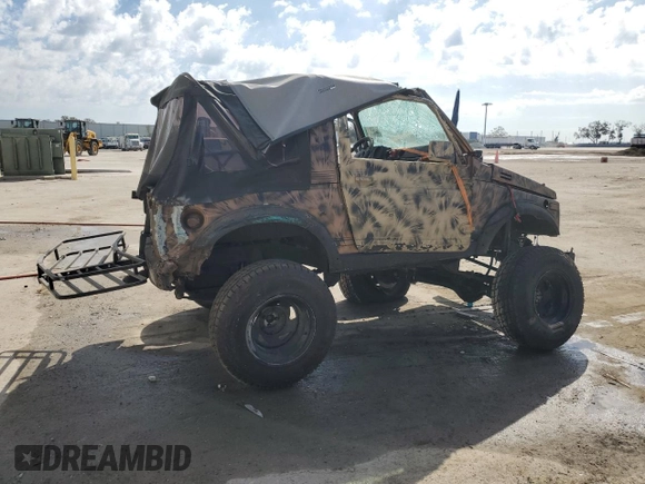 1988 Suzuki Samurai z VIN JS4JC51C6J4271251, wystawiony jako Copart lot #44574795 z przebiegiem 14 542 mil mil oraz Szkody całkowita. Historia ofert i sprzedaży dostępna na DreamBid. Obrazek 3.