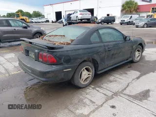 1998 Ford Mustang with VIN 1FAFP4041WF273380, listed as a IAAI auction lot 42549296 with 193,199 mi miles and . Bid and sale history available at DreamBid. Image 4.