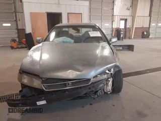 1996 Honda Accord LX with VIN 1HGCD563XTA141867, listed as a IAAI auction lot 41015252 with 420,800 mi miles and . Bid and sale history available at carsss.com. Image 12.