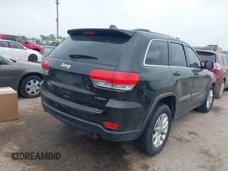 2015 Jeep Grand Cherokee Altitude with VIN 1C4RJEAG3FC944427, listed as a IAAI auction lot 41929483 with 128,114 mi miles. Bid and sale history available at carsss.com. Image 4.