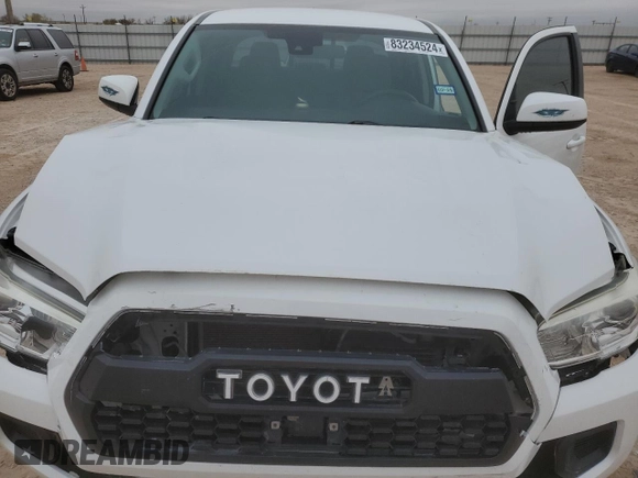 2018 Toyota Tacoma SR with VIN 3TMCZ5AN4JM143350, listed as a Copart auction lot 83234524 with 70,853 mi miles and Clean Title. Bid and sale history available at DreamBid. Image 12.