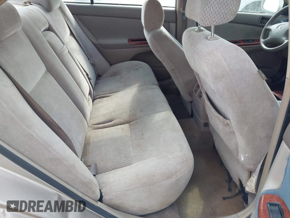 2004 Toyota Camry LE with VIN 4T1BF30K24U570599, listed as a IAAI auction lot 42107715 with 324,191 mi miles and . Bid and sale history available at DreamBid. Image 8.