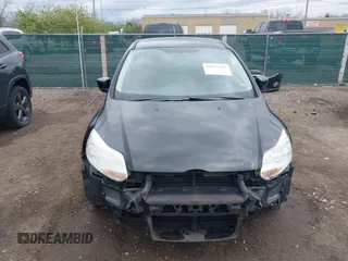 2012 Ford Focus SE with VIN 1FAHP3F27CL112277, listed as a IAAI auction lot 42053243 with 104,885 mi miles. Bid and sale history available at carsss.com. Image 13.