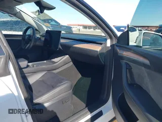 2024 Tesla Model Y Performance with VIN 7SAYGDEF4RF053711, listed as a IAAI auction lot 41836931 with 12,442 mi miles and . Bid and sale history available at DreamBid. Image 5.