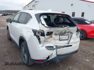 2020 Mazda CX-5 Touring with VIN JM3KFBCM6L0764982, listed as a IAAI auction lot 41632293 with 96,042 mi miles. Bid and sale history available at carsss.com. Image 3.