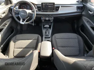 2023 Kia Rio S with VIN 3KPA25AD5PE548218, listed as a Copart auction lot 71808674 with 24,412 mi miles and Salvage Title. Bid and sale history available at DreamBid. Image 8.
