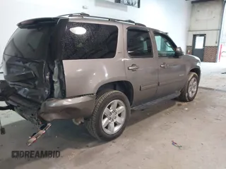 2011 GMC Yukon SLT with VIN 1GKS2CE07BR213141, listed as a IAAI auction lot 41674842 with 226,151 mi miles. Bid and sale history available at carsss.com. Image 4.