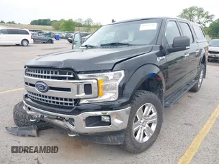 2018 Ford F-150 XL with VIN 1FTEW1E5XJKC37082, listed as a IAAI auction lot 42335721 with 167,401 mi miles and . Bid and sale history available at DreamBid. Image 2.