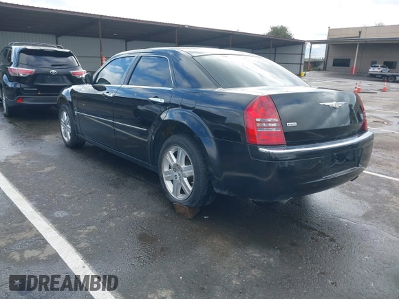 2006 Chrysler 300 C with VIN 2C3LK63H66H142437, listed as a IAAI auction lot 41751890 with 57,374 mi miles. Bid and sale history available at carsss.com. Image 3.