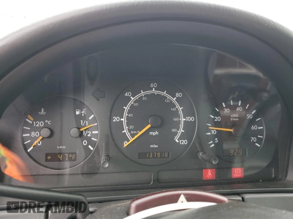 1999 Mercedes-Benz M 320/430/500 with VIN 4JGAB54E7XA078616, listed as a Copart auction lot 55301695 with 137,918 mi miles and Salvage title. Bid and sale history available at DreamBid. Image 9.