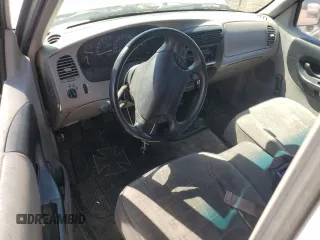 1995 Ford Ranger XL z VIN 1FTCR14A0SPA28290, wystawiony jako Copart lot #61943475 z przebiegiem 210 000 mil mil oraz Czysty tytuł • Clean title. Historia ofert i sprzedaży dostępna na DreamBid. Obrazek 8.