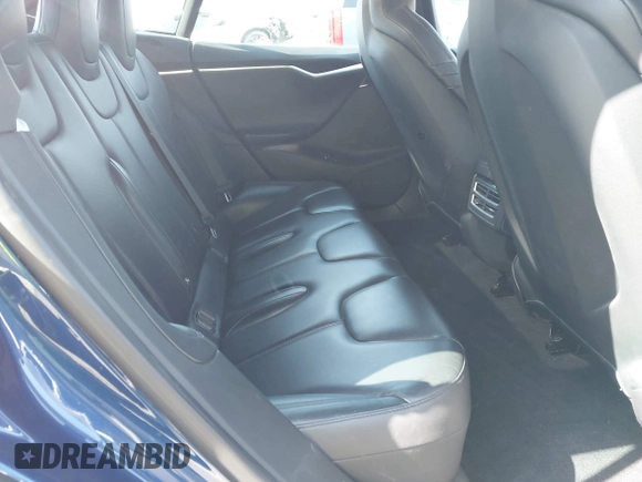 2016 Tesla Model S 90D with VIN 5YJSA1E25GF157220, listed as a IAAI auction lot 42003019 with 130,540 mi miles and . Bid and sale history available at DreamBid. Image 8.