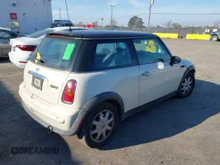 2003 MINI Hardtop with VIN WMWRC33433TE14150, listed as a IAAI auction lot 41313860 with 209,684 mi miles and . Bid and sale history available at DreamBid. Image 4.
