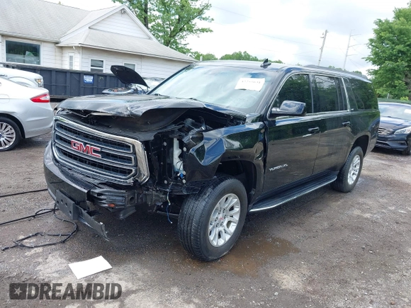 2019 GMC Yukon XL SLT z VIN 1GKS2GKC0KR394301, wystawiony jako IAAI lot #42255631 z przebiegiem 149 222 mil mil oraz . Historia ofert i sprzedaży dostępna na DreamBid. Obrazek 2.