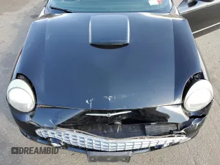 2003 Ford Thunderbird Deluxe z VIN 1FAHP60A63Y104093, wystawiony jako Copart lot #76028744 z przebiegiem 79 995 mil mil oraz Szkoda całkowita • Salvage title. Historia ofert i sprzedaży dostępna na DreamBid. Obrazek 11.