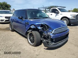 2012 MINI Hardtop z VIN WMWSU3C5XCT368997, wystawiony jako Copart lot #54622735 z przebiegiem 104 261 mil mil oraz Szkoda całkowita • Salvage title. Historia ofert i sprzedaży dostępna na DreamBid. Obrazek 4.