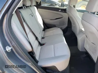2017 Hyundai Tucson SE z VIN KM8J33A44HU376246, wystawiony jako Copart lot #52453345 z przebiegiem 97 306 mil mil oraz Szkody całkowita. Historia ofert i sprzedaży dostępna na DreamBid. Obrazek 11.