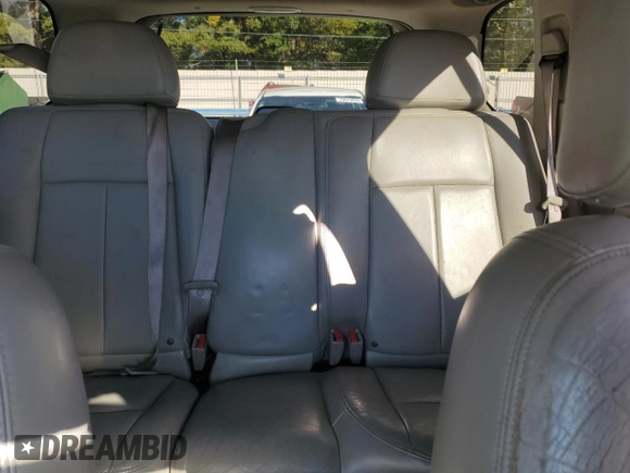 2006 GMC Envoy Denali with VIN 1GKES63M962257466, listed as a Copart auction lot 76821124 with 171,266 mi miles and Salvage Title. Bid and sale history available at carsss.com. Image 10.